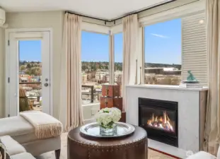Welcome to your South East Corner View Home at Waterview Condominiums. Lovely views over Downtown Kirkland and a gas fireplace to keep you warm and cozy on those cool evenings along with AC for warm summer days.