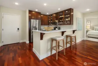 Eating space at the bar height island, cozy dinners, or great for extra seating.