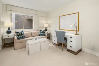 Second bedroom with bed put away turns into a perfect office!