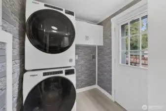 A full-size, stackable front-loading washer and dryer adds everyday convenience