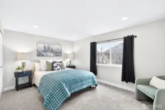 The primary bedroom offers a private ¾ ensuite bath for added comfort and convenience.