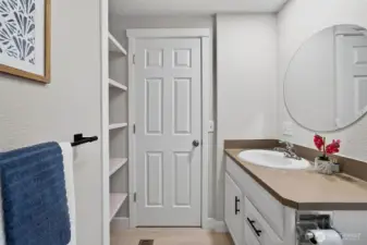 With built-in shelving and smart storage, the ensuite is designed to keep everything organized, functional, and effortlessly tidy