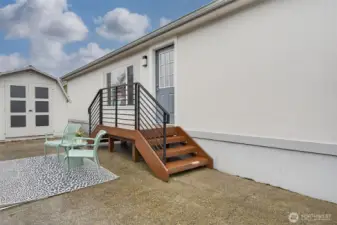 Welcoming front porch, convenient storage shed, and outdoor space ready for relaxing, gathering, and making it your own.