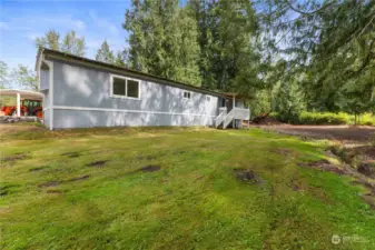 The ADU home features a back porch