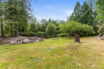 Expansive lawns stretch to the rear of the property