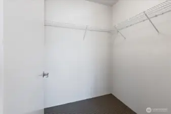 Large walk-in closet in Primary Bedroom