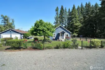 Extra large two car garage with storage and workshop, plenty of parking, fully fenced and cross fenced, gorgeous fresh landscaping, grass has been retouched