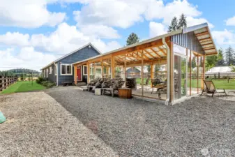 Rear look at covered and enclose patio, grass has been retouched
