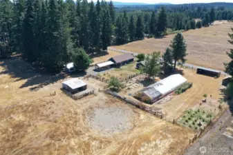 Aerial view of front of property looking southeast, property is fully fenced and cross fenced for all your animal needs!