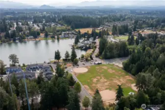 Public Allan Yorke Park w/Lake Tapps public access, skate park, ball fields, picnic areas and snack bar.