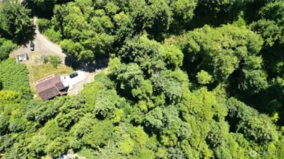 Drone view of land and nextdoor neighbor