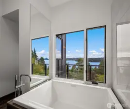Cleverly designed, the bathroom features a mirror above the tub that perfectly reflects the stunning Seattle skyline—a truly unique touch!