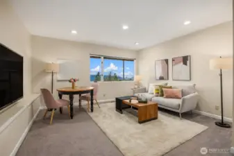Even the lower-level rec room is filled with natural light and offers scenic lake views!