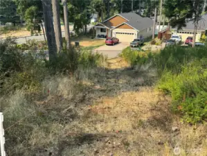 Driveway easement to the Timber Lane cul-de-sac. Approx, 12' in width.