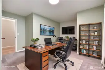 As you head down the hall to your right, you will come upon a bedroom, was used as an office by the owners. ***Virtually Staged***