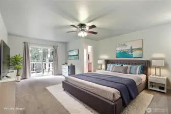 Primary bedroom suite view, generous is size, I really love the patio doors leading to your brand new deck. ***Virtually Staged***