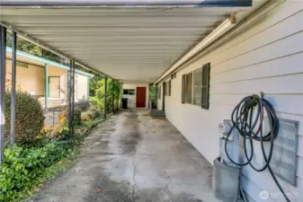 Room for 2+ cars in the carport, & great shed for storage ~