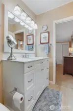 Master bedroom suite overlooks the community pond and greenbelt.  Double closets, vaulted ceilings and a remodeled full bathroom with a walk in shower