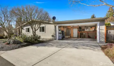 2 car attached garage and level driveway with additional 2 uncovered parking spaces