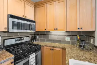 You'll swoon for the gas range, undercount lighting and custom cabinets.  All appliances included with this sale