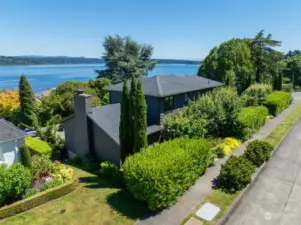 Just a block or so from the shores of Lake WA lies this architectural gem. Just two houses on the whole block! Residential parking in front, garage and driveway off Lakeside Ave S