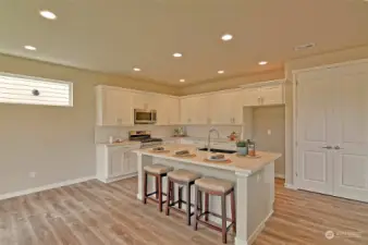 Photos are of similar home built by this Builder and are for illustration purposes only to reflect layout and typical finishes. May depict seller enhancements. Colors and options may vary.