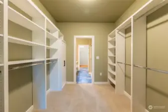 Walk-in primary closet.