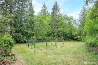 Lower field with a large fenced garden area.