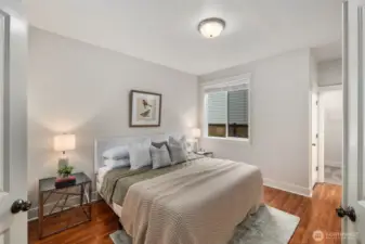 Main level opportunity for a second primary ensuite bedroom. Lareg walk in closet + linen closet + 3/4 bathroom complete this space.