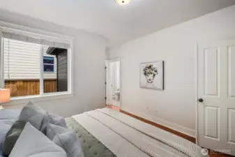 Main level opportunity for a second primary ensuite bedroom. Lareg walk in closet + linen closet + 3/4 bathroom complete this space.