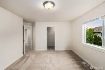 Guest bedroom 1 comlete with fresh paint + new carpet + walk in closet.