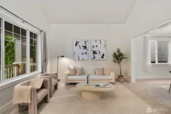 Formal and naturally-lit living space. New carpeting and freshly painted interior walls, trim and doors make this home move in ready.  Formal dining room to the right with an attached butler's pantry area.