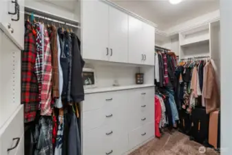 Dream closet in the primary bedroom is larger than pictured and finished with a closet system by ClosetsbyDesign.