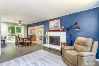 Relax by the cozy gas fireplace in this inviting home.