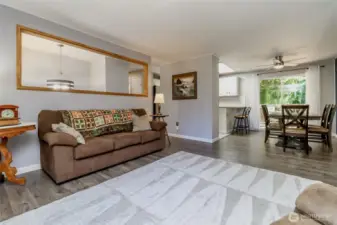 Versatile entertaining spaces with easy access to the modern kitchen, solarium, and deck