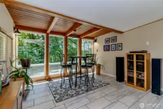 Enjoy your morning coffee in the sunlit solarium enjoying the view of the peaceful & private back yard.