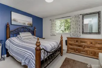 Private primary bedroom on the backside, offering tranquility