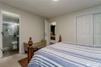 Second view of the spacious primary bedroom, showcasing comfort