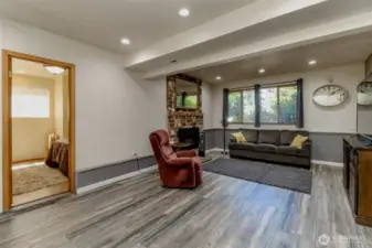 Large open space downstairs, perfect for a home theater, gym, or activity room