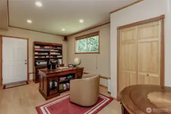 Large home office with exterior access, perfect for a home business or separate living space