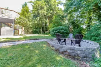 Enjoy s’mores around the firepit in the private backyard of this retreat.