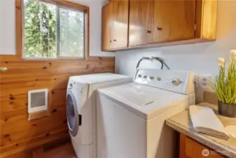 Washer and Drier in the bathroom.
