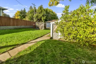 Newer fence and concrete blocks for privacy.