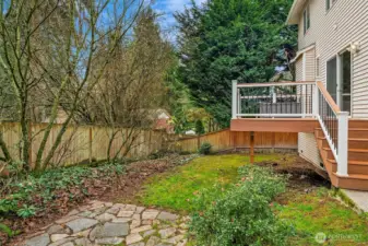 Paved Patio Area and Backyard. Side Yard has fenced dog run