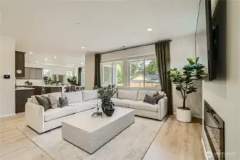 Great room  Photos are representation as the home is under construction.