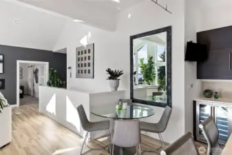 View looking over the stairs that go down to the lower level.