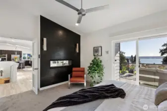 Primary bedroom views and slider out to the hot tub and seating area.