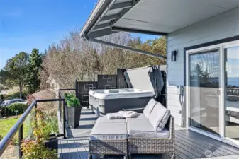 Seating area just off hot tub.