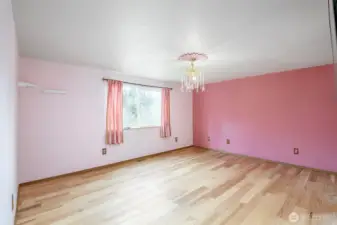 Expansive main floor primary bedroom