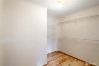 Walk in closet off of primary bedroom.